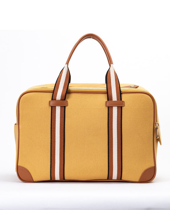 backside look of yellow mustard canvas dog carrier